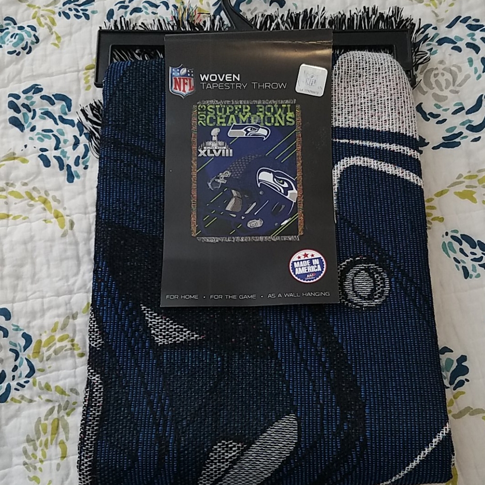 Seahawks woven tapestry throw.
